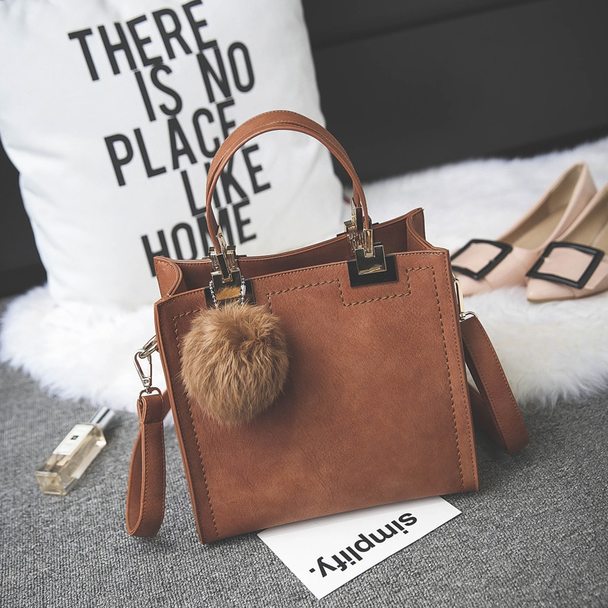 ANNA'S LAETHER HANDBAG WITH FUR BALL