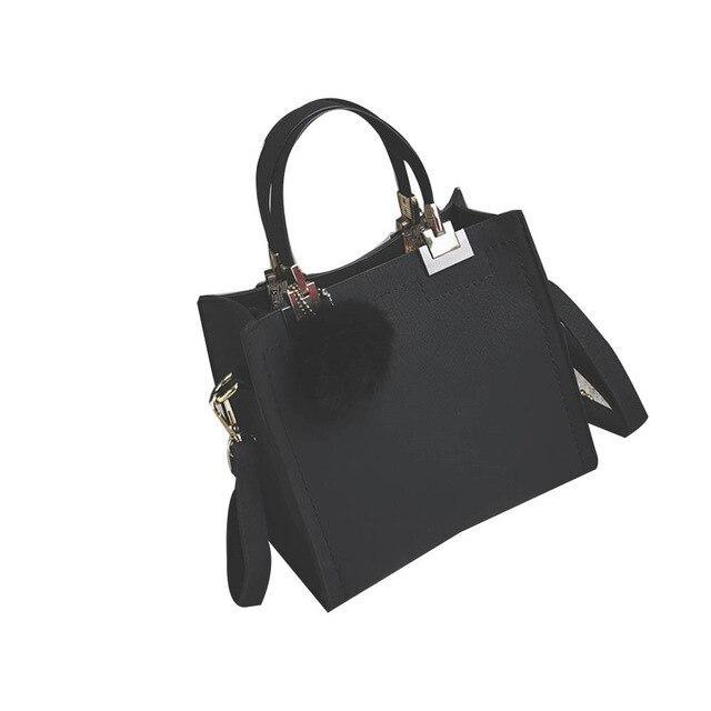 ANNA'S LAETHER HANDBAG WITH FUR BALL