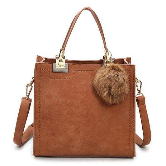 ANNA'S LAETHER HANDBAG WITH FUR BALL